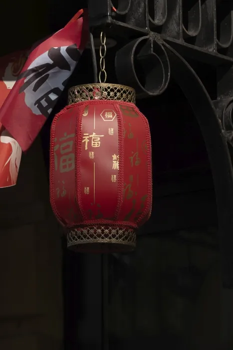 Framed Print : Red fabric chinese lantern hanging over porch