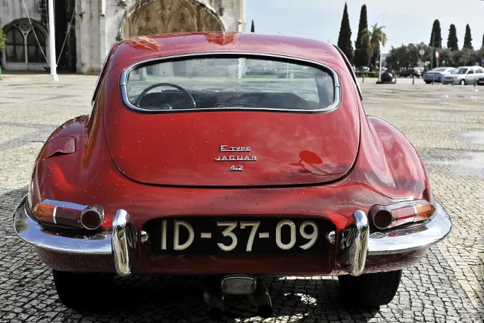 Framed Print : Red Jaguar E-Type classic car from behind in a square Framed Print : Red Jaguar E-Type classic car from behind in a square