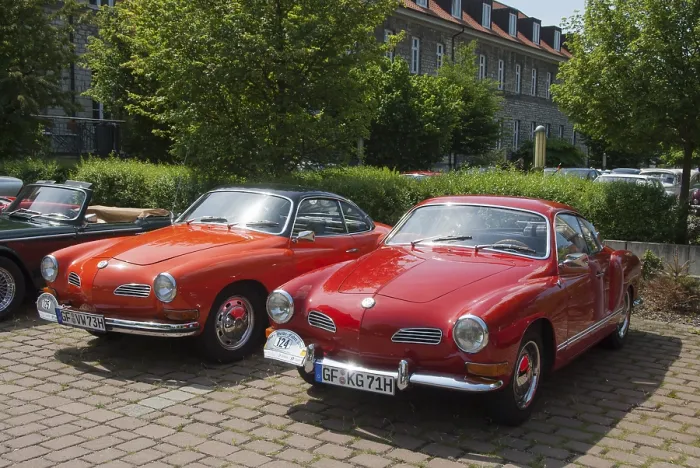 Framed Print : Two red Karmann Ghia vintage cars standing next to each other on a paved car park Framed Print : Two red Karmann Ghia vintage cars standing next to each other on a paved car park