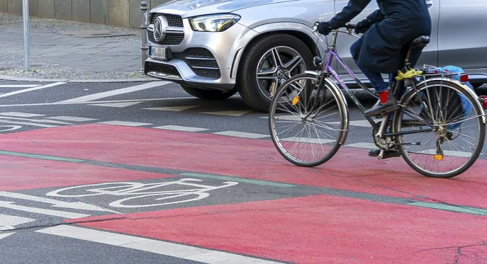 Framed Print : Red marked cycle path in the city centre
