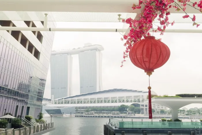 Framed Print : Red paper lantern with modern Singapore architecture surrounding