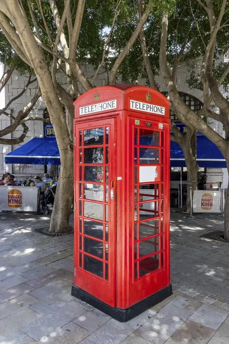Framed Print : Red telephone boxes, a piece of British culture in the old town Framed Print : Red telephone boxes, a piece of British culture in the old town
