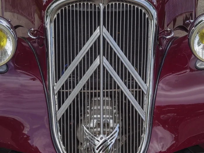 Framed Print : Red vintage car with vertical radiator grille and eye-catching emblem Framed Print : Red vintage car with vertical radiator grille and eye-catching emblem