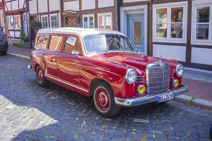 Framed Print : Red vintage Mercedes Benz estate car parked in Hildesheim's old town