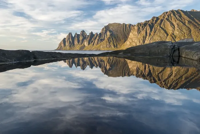 Framed Print : Reflection in the water with Tungeneset