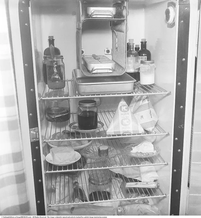 Framed Print : In the refrigerator 1951. Food products of various kinds that are seen on the shelves