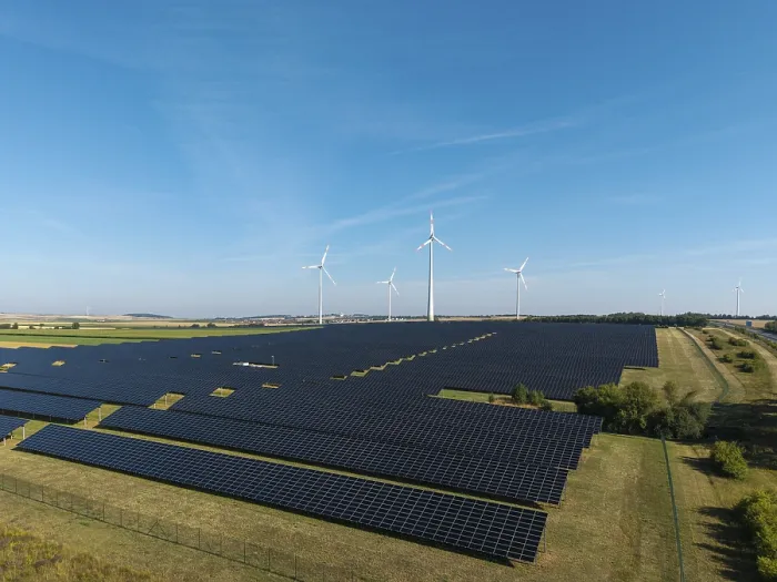 Framed Print : Renewable energy sources with solar and wind systems on an extensive field Framed Print : Renewable energy sources with solar and wind systems on an extensive field