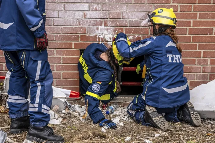 Framed Print : Rescue and recovery of people after a drone attack on a residential building in a civil defence scenario Framed Print : Rescue and recovery of people after a drone attack on a residential building in a civil defence scenario