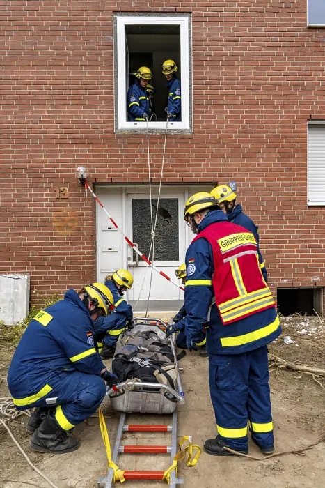 Framed Print : Rescue and recovery of people after a drone attack on residential buildings in a civil defence scenario