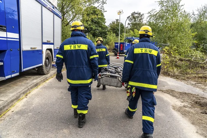 Framed Print : Rescue and recovery of people after a drone attack on residential buildings in a civil defence scenario