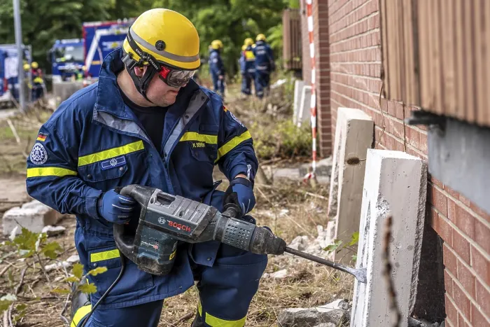 Framed Print : Rescue and recovery of people after a drone attack on residential buildings in a civil defence scenario