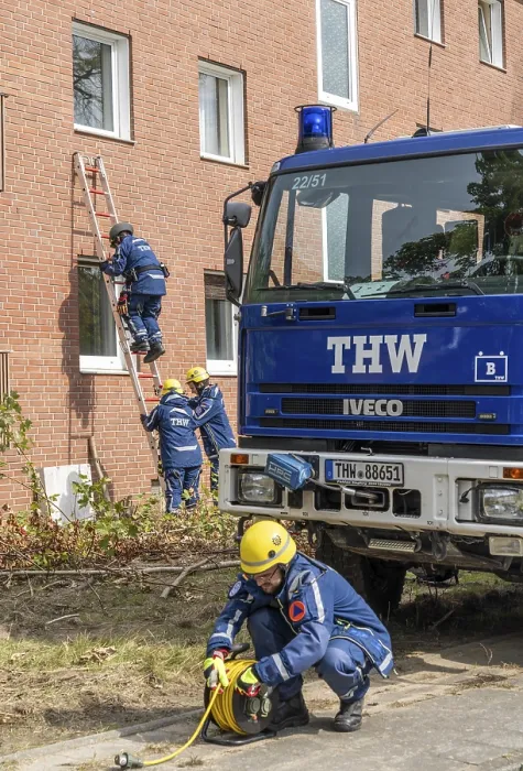 Framed Print : Rescue and recovery of people after a drone attack on residential buildings in a civil defence scenario