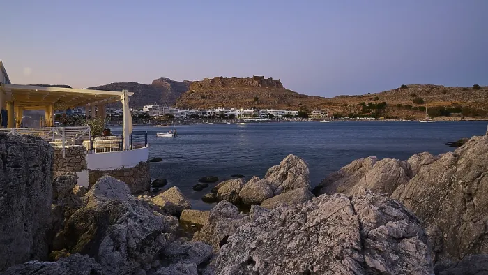 Framed Print : Restaurant Argo, Rock-framed view of a coastal town and sea at dusk Framed Print : Restaurant Argo, Rock-framed view of a coastal town and sea at dusk