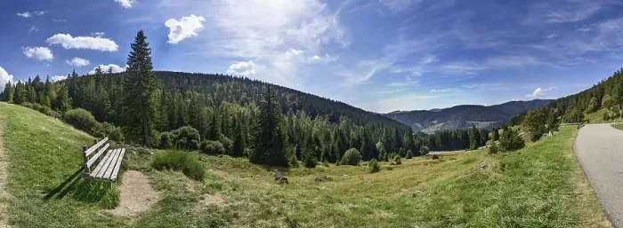 Framed Print : Resting place with bench and view over the landscape of the Black Forest with coniferous forests and hills near St