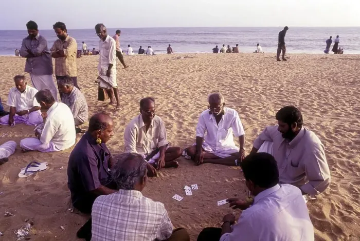 Framed Print : Retired men playing cards in their leisure time at Kollam Quilon Beach Framed Print : Retired men playing cards in their leisure time at Kollam Quilon Beach