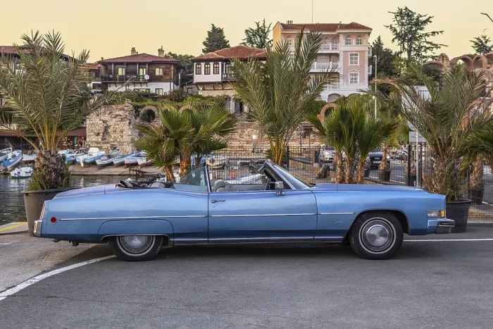Framed Print : Retro blue convertible Cadillac Eldorado on port of Nessebar Framed Print : Retro blue convertible Cadillac Eldorado on port of Nessebar