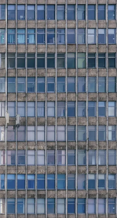 Framed Print : Front of Retro High-rise Office Building Framed Print : Front of Retro High-rise Office Building