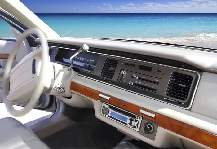 Framed Print : Retro vintage car indoor with tropical Caribbean beach in window Framed Print : Retro vintage car indoor with tropical Caribbean beach in window