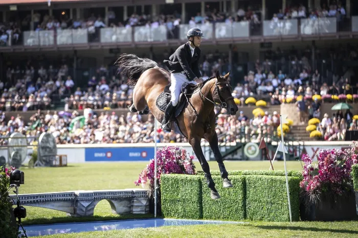 Framed Print : Richard Vogel of Germany and riding United Touchs compete in the first round of the 1