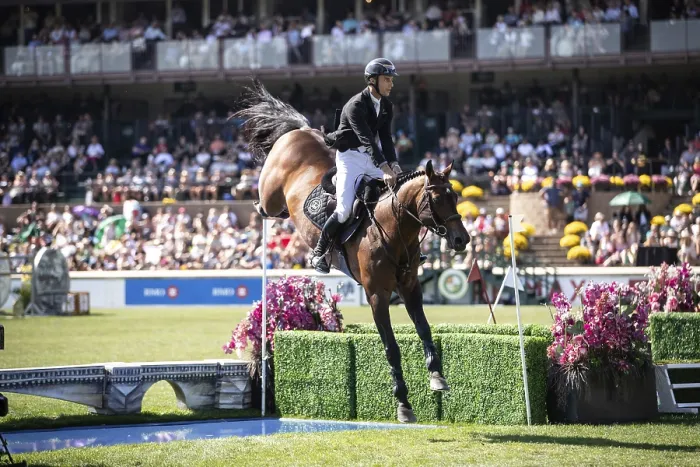 Framed Print : Richard Vogel of Germany and riding United Touchs compete in the first round of the 1