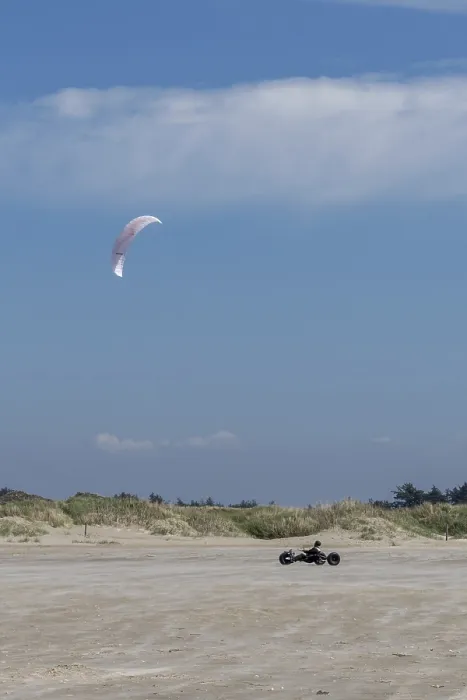 Framed Print : Ringby, Denmark - 30 May, 2021: kite buggy enjoying a windy day on the Wadden Sea island beaches of western Denmark Framed Print : Ringby, Denmark - 30 May, 2021: kite buggy enjoying a windy day on the Wadden Sea island beaches of western Denmark