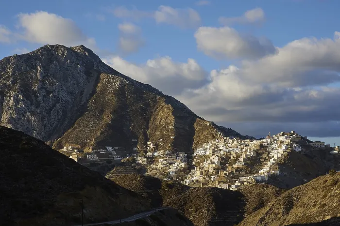 Framed Print : A rising village on a mountain ridge