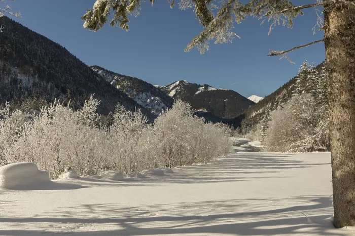Framed Print : The Riss creek flowing through a snow covered landscape in the Eng valley