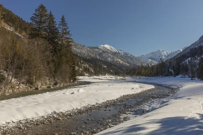 Framed Print : The Riss creek flowing through a snow covered landscape in the Eng valley