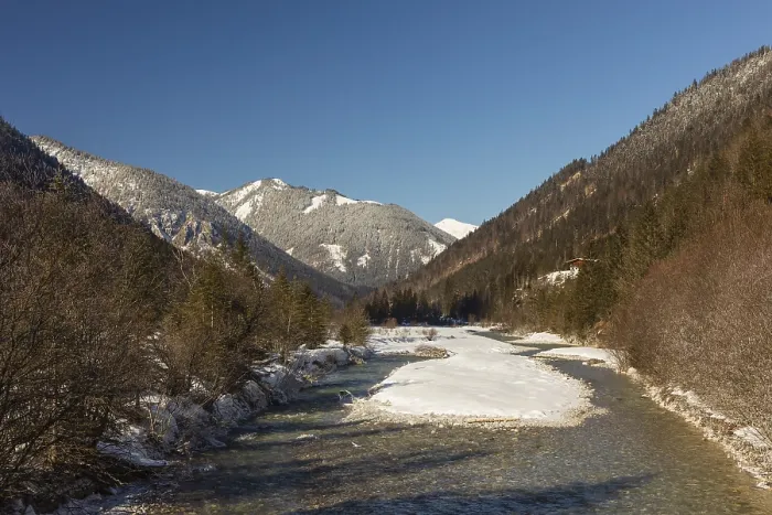 Framed Print : The Riss creek flowing through a snow covered landscape in the Eng valley