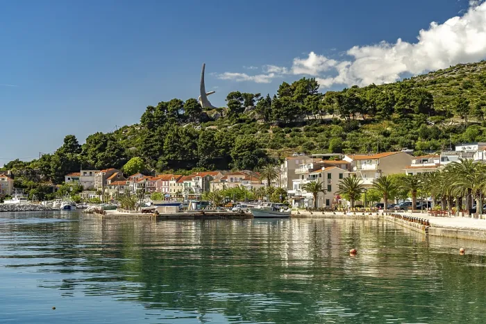Framed Print : The Riva waterfront promenade and the seagull wing monument in Podgora Framed Print : The Riva waterfront promenade and the seagull wing monument in Podgora