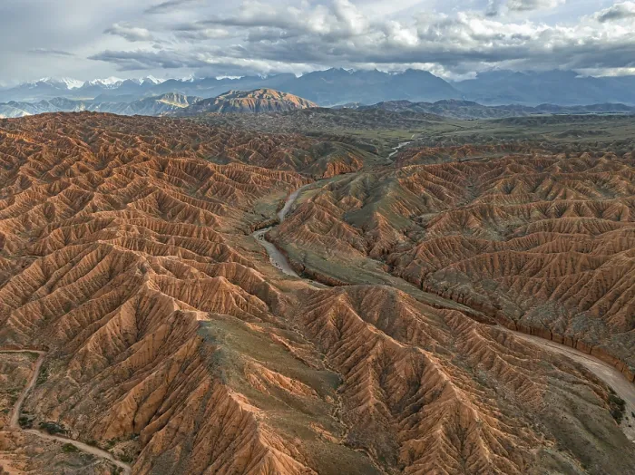Framed Print : River bed runs through a landscape of eroded hills Framed Print : River bed runs through a landscape of eroded hills