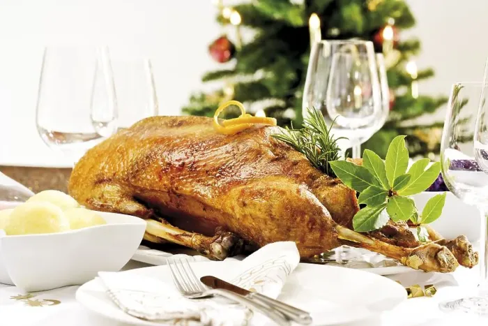 Framed Print : Roast goose, dumplings on a festively decorated table Framed Print : Roast goose, dumplings on a festively decorated table