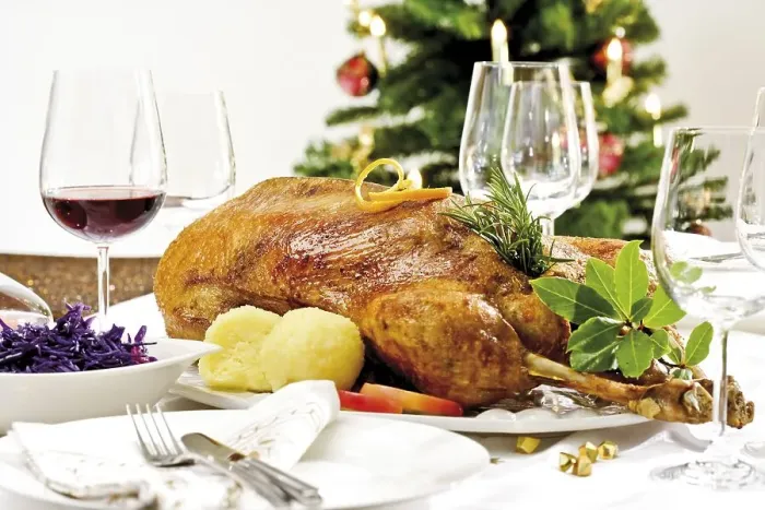Framed Print : Roast goose, red cabbage, dumplings on a festively decorated table Framed Print : Roast goose, red cabbage, dumplings on a festively decorated table