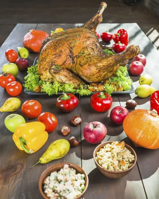 Framed Print : Roasted turkey with vegetables wooden table