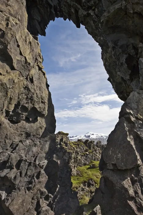 Framed Print : Rock window, lava rock formations with Mt