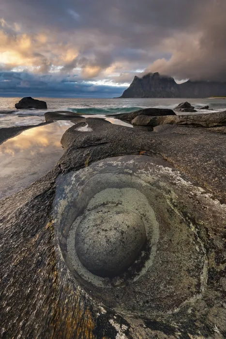 Framed Print : Rocks on the beach of Uttakleiv at evening light