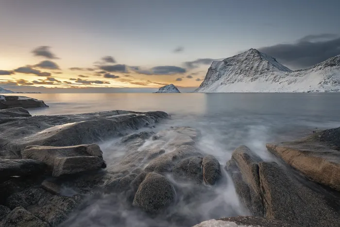 Framed Print : Rocky coast Haukland Beach in the evening light