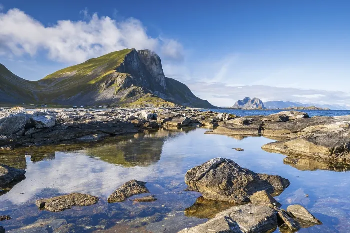 Framed Print : Rocky coast and mountains of the island of Vaeroy Framed Print : Rocky coast and mountains of the island of Vaeroy