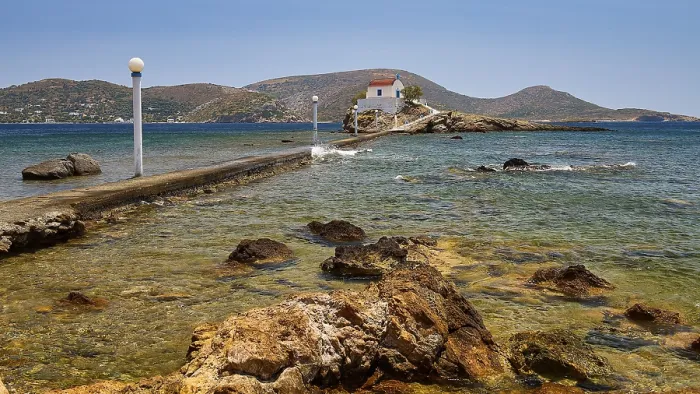 Framed Print : Rocky coastal landscape with lonely chapel