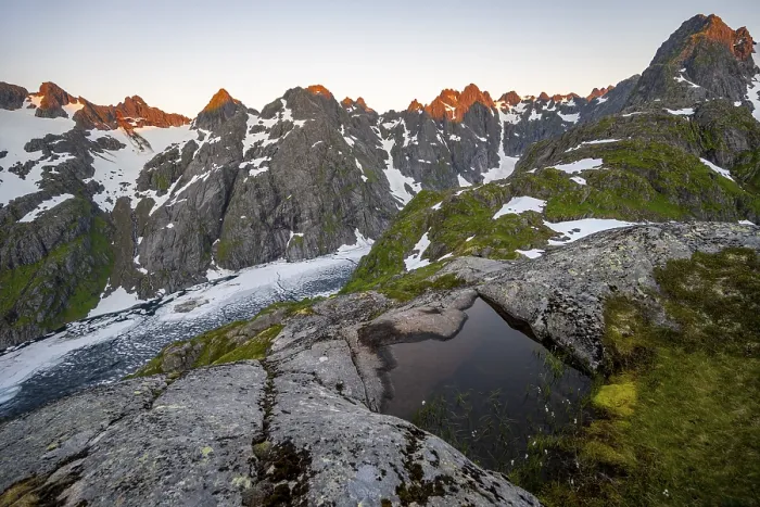 Framed Print : Rocky mountain peaks and Trollfjordvatnet with snow