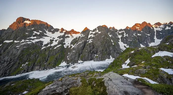 Framed Print : Rocky mountain peaks and Trollfjordvatnet with snow