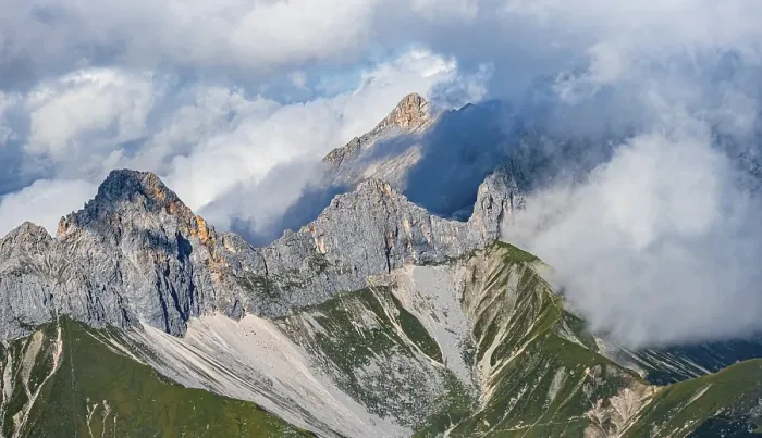 Framed Print : Rocky mountain ridge, cloudy peaks Oberreintalschrofen and Scharnitzspitze