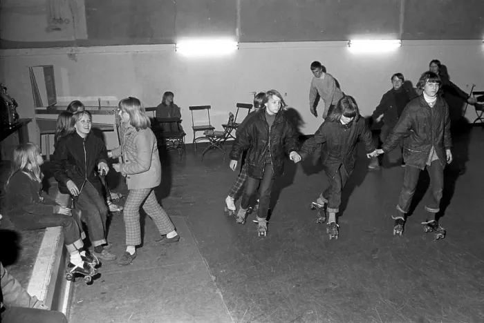 Framed Print : Roller skate fun in the 1960s. Interior of a roller disco with people roller skating Framed Print : Roller skate fun in the 1960s. Interior of a roller disco with people roller skating