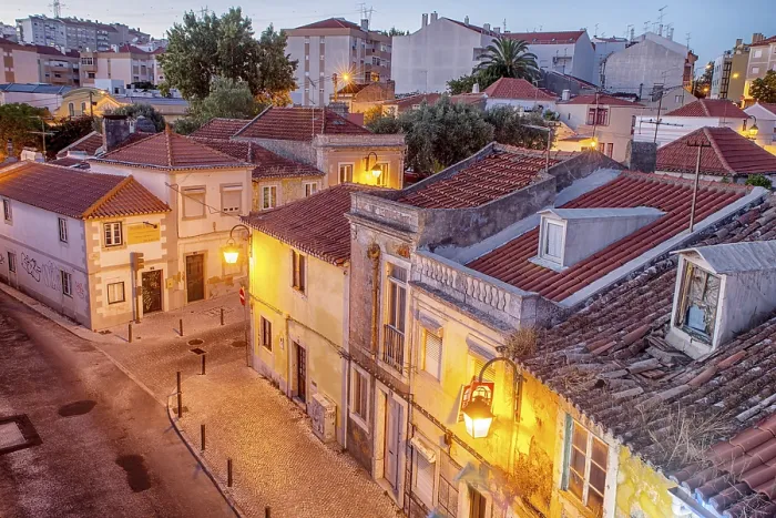 Framed Print : Romantic Lisbon street with the typical old buildings and new buildings