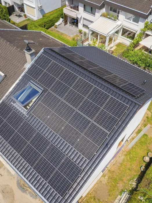Framed Print : Roof with solar modules in a residential area with green surroundings Framed Print : Roof with solar modules in a residential area with green surroundings