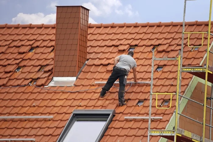 Framed Print : Roofing work, re-roofing of a tiled roof