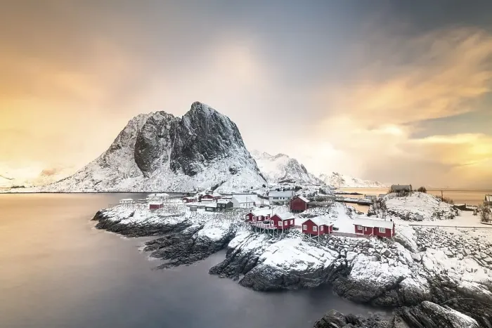 Framed Print : Rorbuer fishermen's cabins by the snowy fjord Framed Print : Rorbuer fishermen's cabins by the snowy fjord