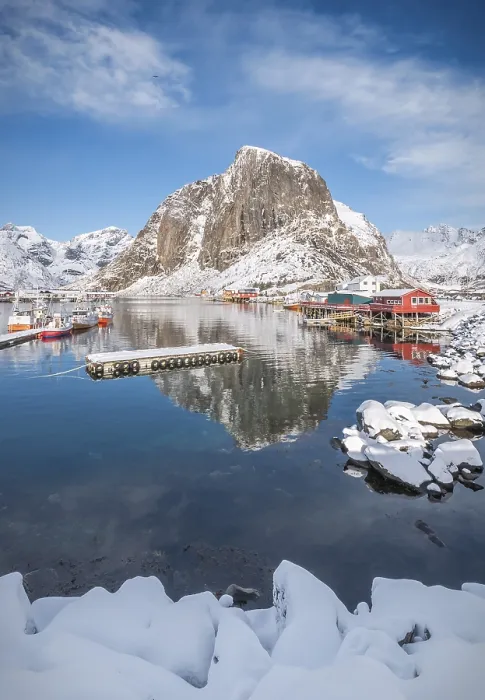 Framed Print : Rorbuer fishermen's cabins on the snowy fjord