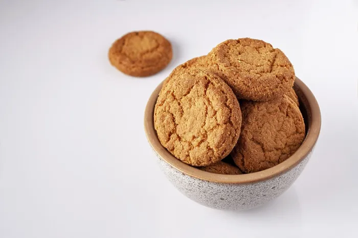 Framed Print : Round oatmeal cookies lie in a gray ceramic bowl
