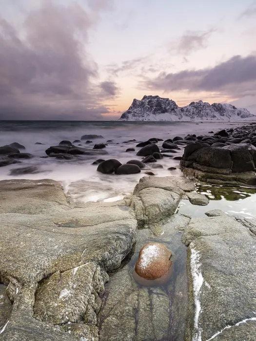 Framed Print : Rounded rocks on Utakleiv beach in a dramatic cloudy atmosphere Framed Print : Rounded rocks on Utakleiv beach in a dramatic cloudy atmosphere